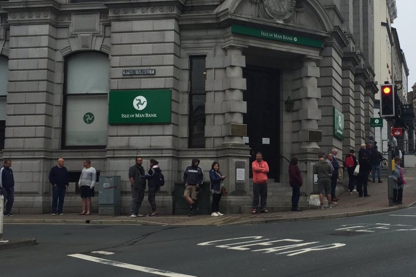 Customers queuing up outside the Athol Street Branch of IOM Bank (June 2020)