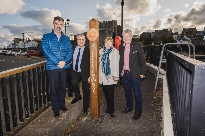 (L-R): Laurence Skelly MHK, Minister for Enterprise,  Ray Harmer MHK, Minister for Infrastructure, Susan Skillen, Blue Badge Guide and Ranald Caldwell, Non-executive Chairman of Visit Isle of Man Agency at Thirtle Bridge, Castletown.