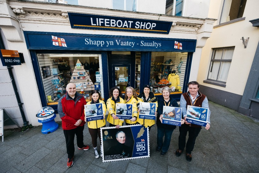 RNLI Volunteers at Ramsey Lifeboat Shop (L-R) Andy Collins, Manager of Ramsey Lifeboat Shop, Breesha Cowin, Trainee Crew at Douglas Lifeboat, Emma Lu Cornu, Chair of Peel Lifeboat Fundraising Crew, Tractor Driver and Head Launcher, Claire Hamer, Water Safety Officer and Peel Shore Crew, Rachel Carine, Crew Member at Ramsey Lifeboat and Lifeboat Shop Volunteer, Angie Collins, Ramsey Lifeboat Shop Volunteer, Charles McHardy, Ramsey Lifeboat Shop Volunteer.