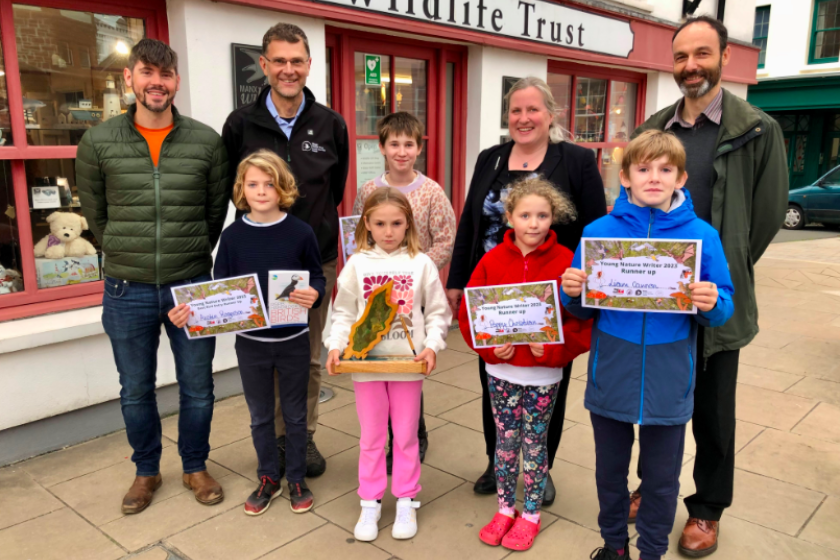 Pic: Dr Michelle Haywood MHK, Member of DEFA with responsibility for Environment, with, from left, Rob Fisher from MOS, Leigh Morris from Manx Wildlife Trust and Dr Richard Selman from DEFA, and with winners and runners up in the Young Nature Writer competition 2023. From left, Austin Rogerson; overall winner Kayleigh Cannon; River Kelly-Brown; Poppy Christian; Liam Cannon. Best bird entry winner Delta Baptist was unable to attend the presentation.