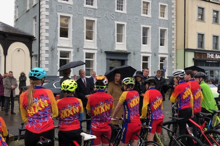 HRH The Princess Royal speaking to members of the Manx Youth Cycling team in Douglas this morning.